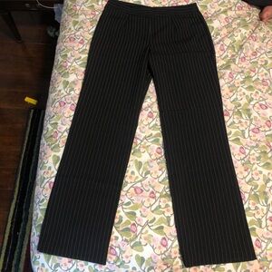 Vintage 90s Black pinstriped trousers with a flattering fit